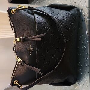 Authentic Louis Vuitton Black Shoulder Bag with Gold Accents. Nearly New